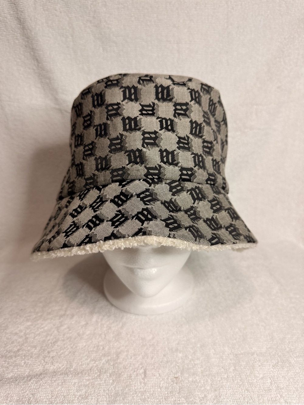MISBHV Monogram-Pattern Bucket Hat in Black and Gray